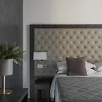 Re Enzo Suites