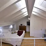 Al Cappello Rosso Suite Apartments
